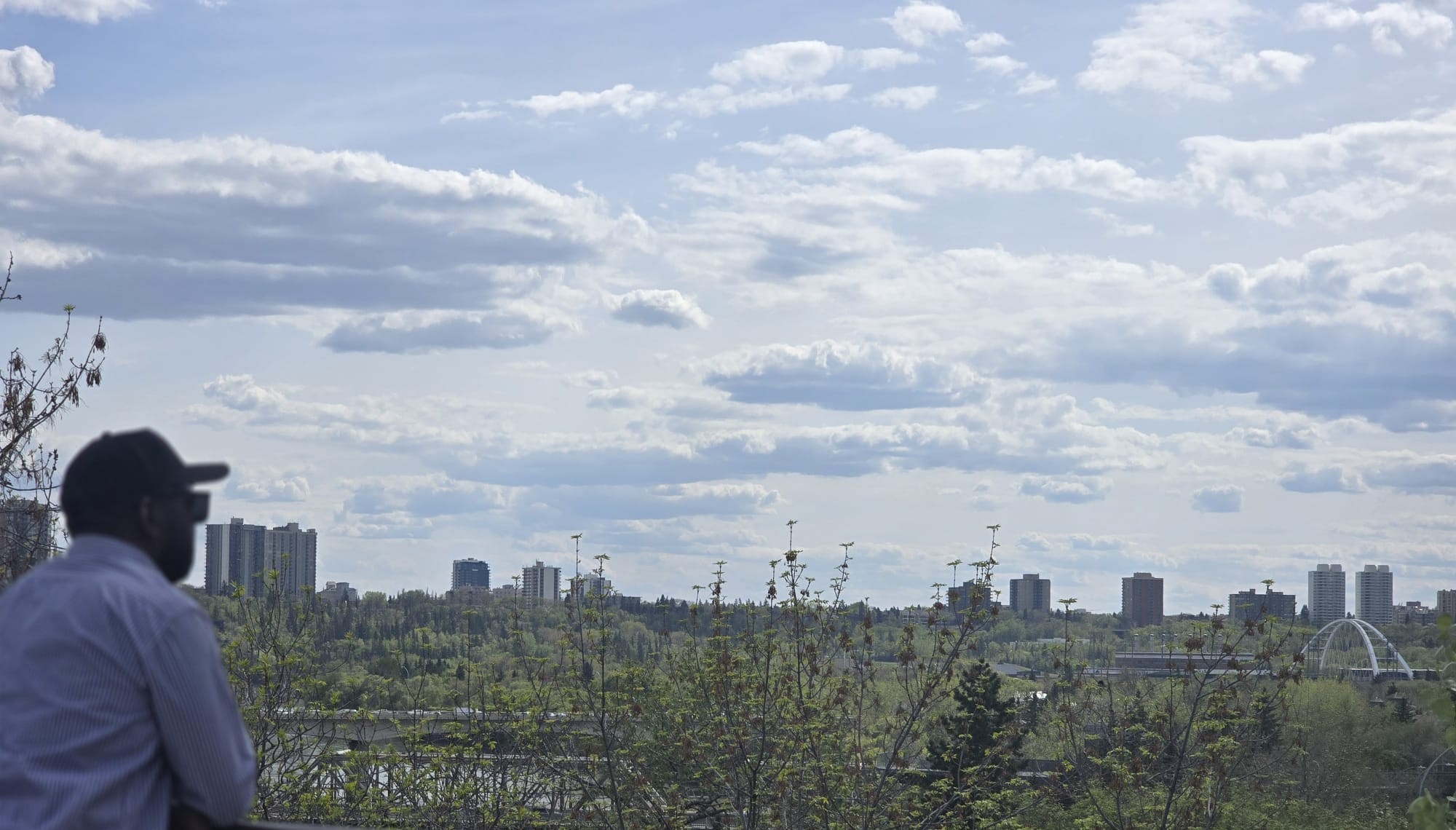 Brian Ssennoga looking out over Edmonton, Alberta