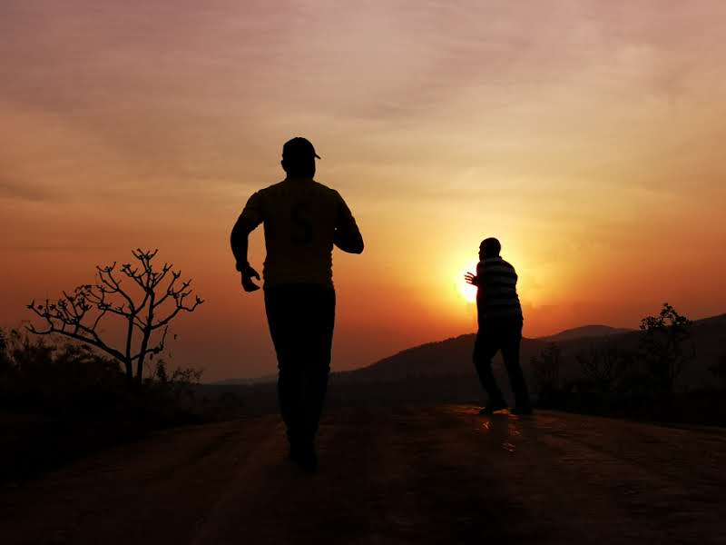 Running at sunset — Uganda hills, early years