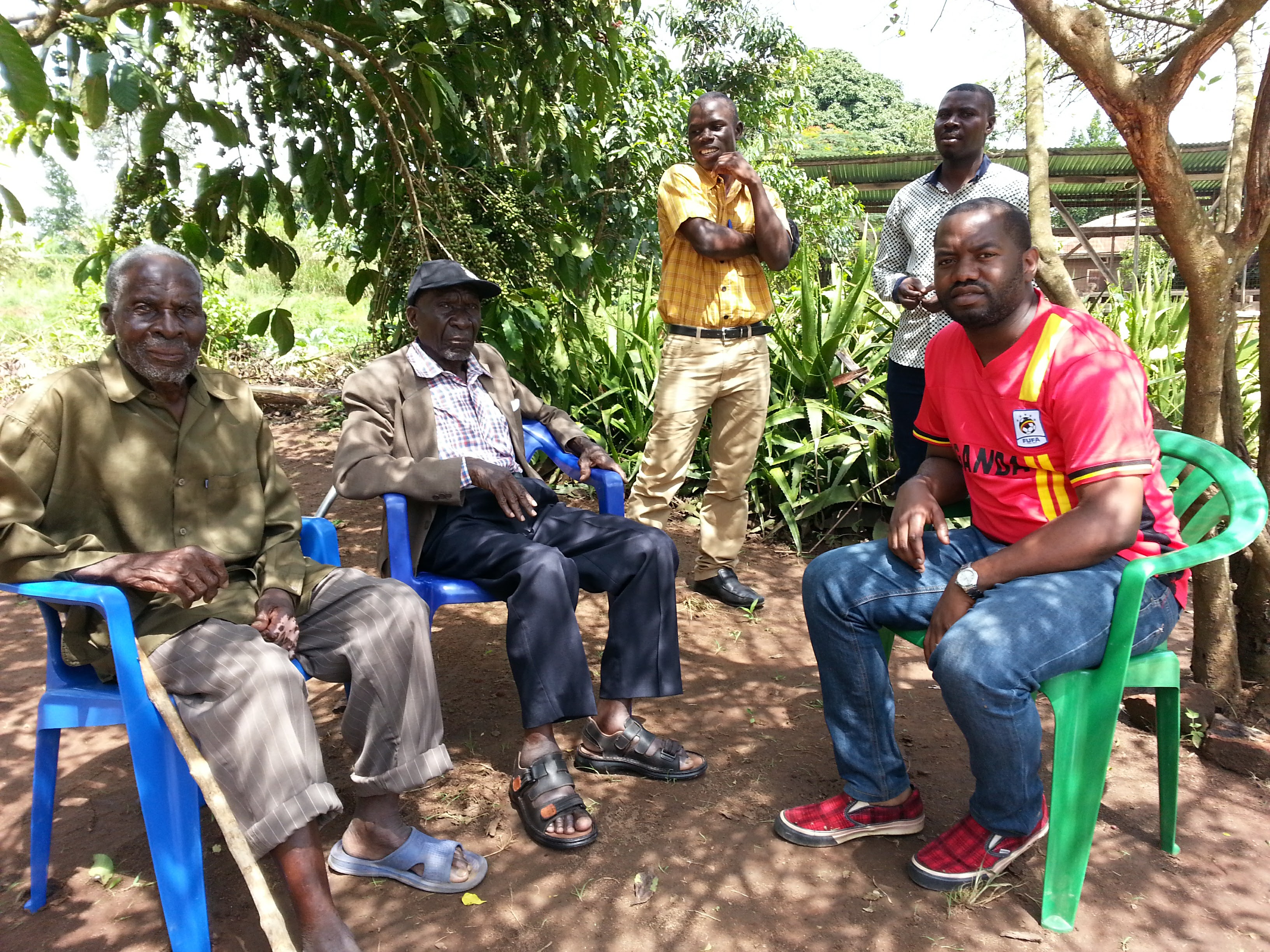 Brian Ssennoga with elders — Kampala, Uganda